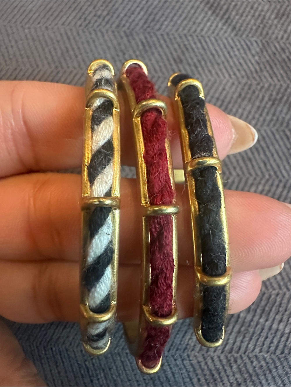 Madewell gold tone bangle set.  Trio in Black, Burgundy and Two-Tone